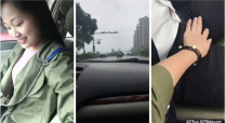 白皙漂亮的美女看見出差剛回來的男友突然開車接她下班,興奮不已說：今天在車上玩玩吧.2人在馬路邊玩車震